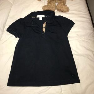 Girl’s Burberry shirt.